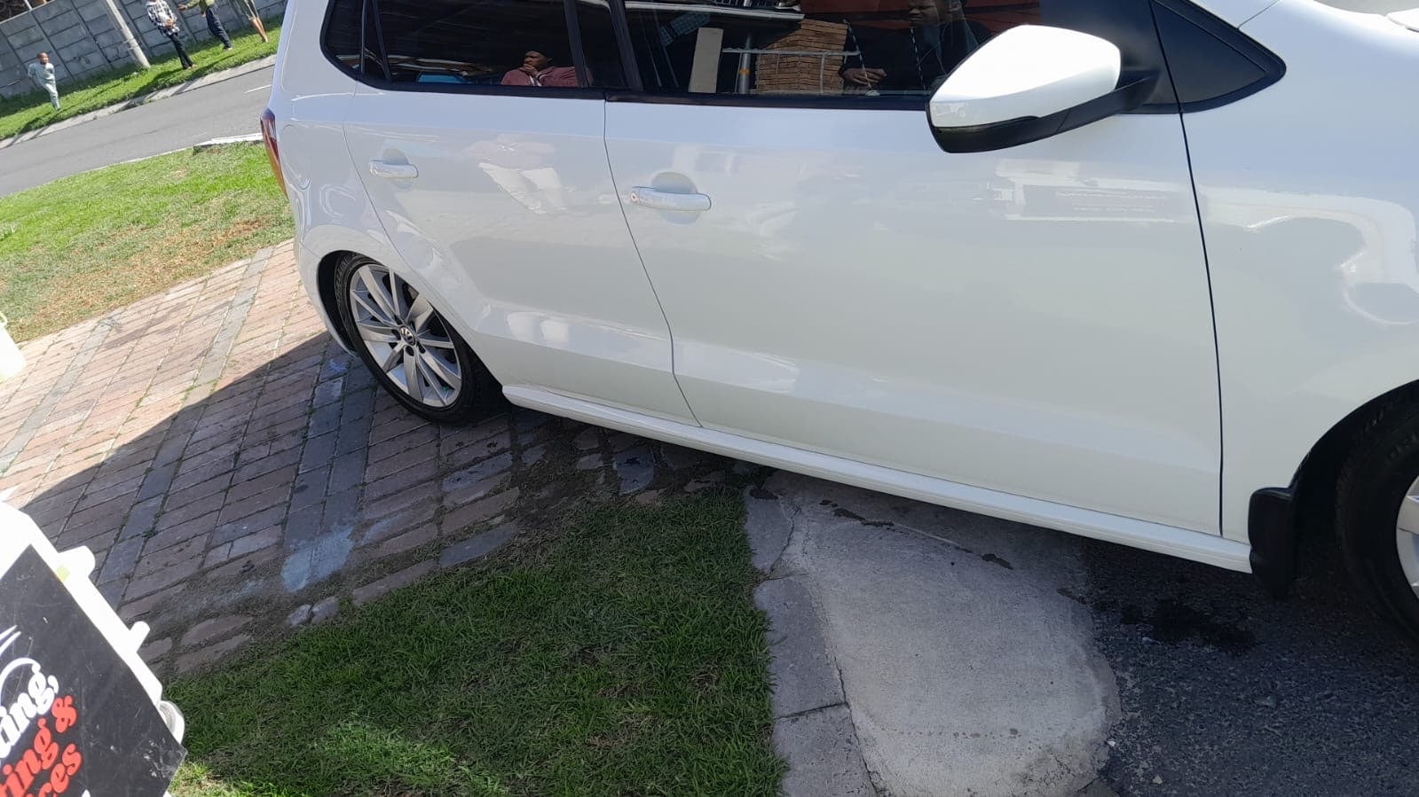 White Volkswagen Polo side finish after ACJ repair