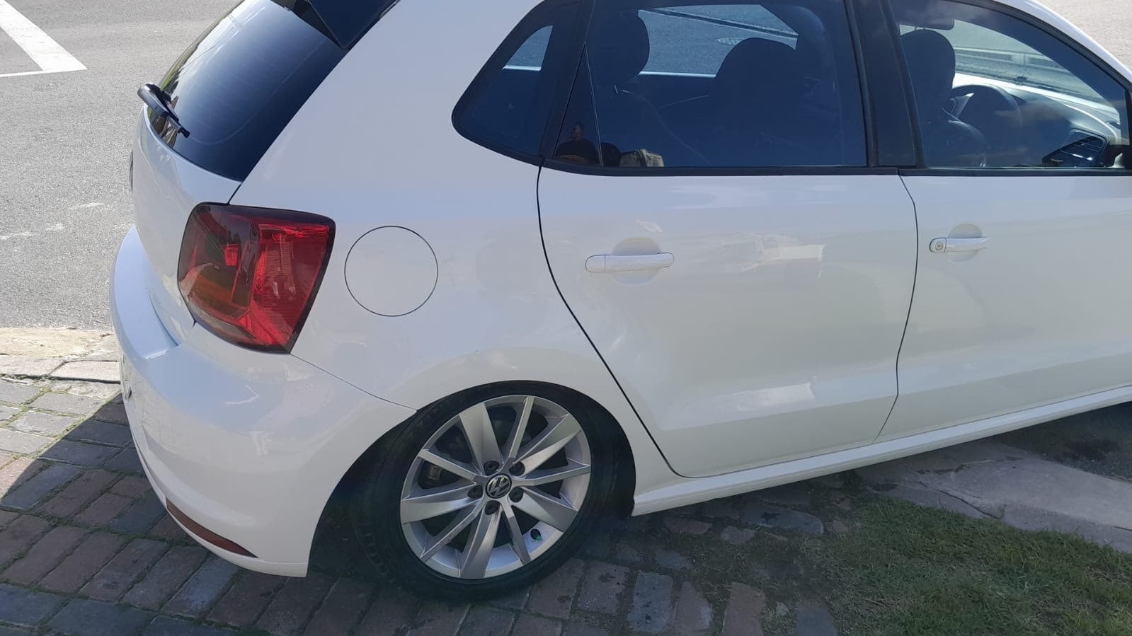 White Volkswagen Polo rear quarter panel after ACJ repair
