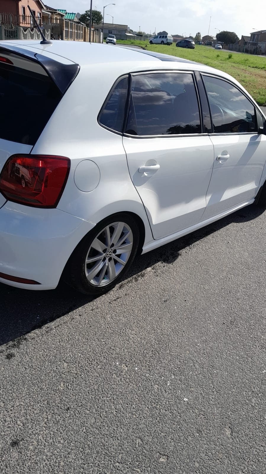 White Volkswagen Polo rear three-quarter view after ACJ repair